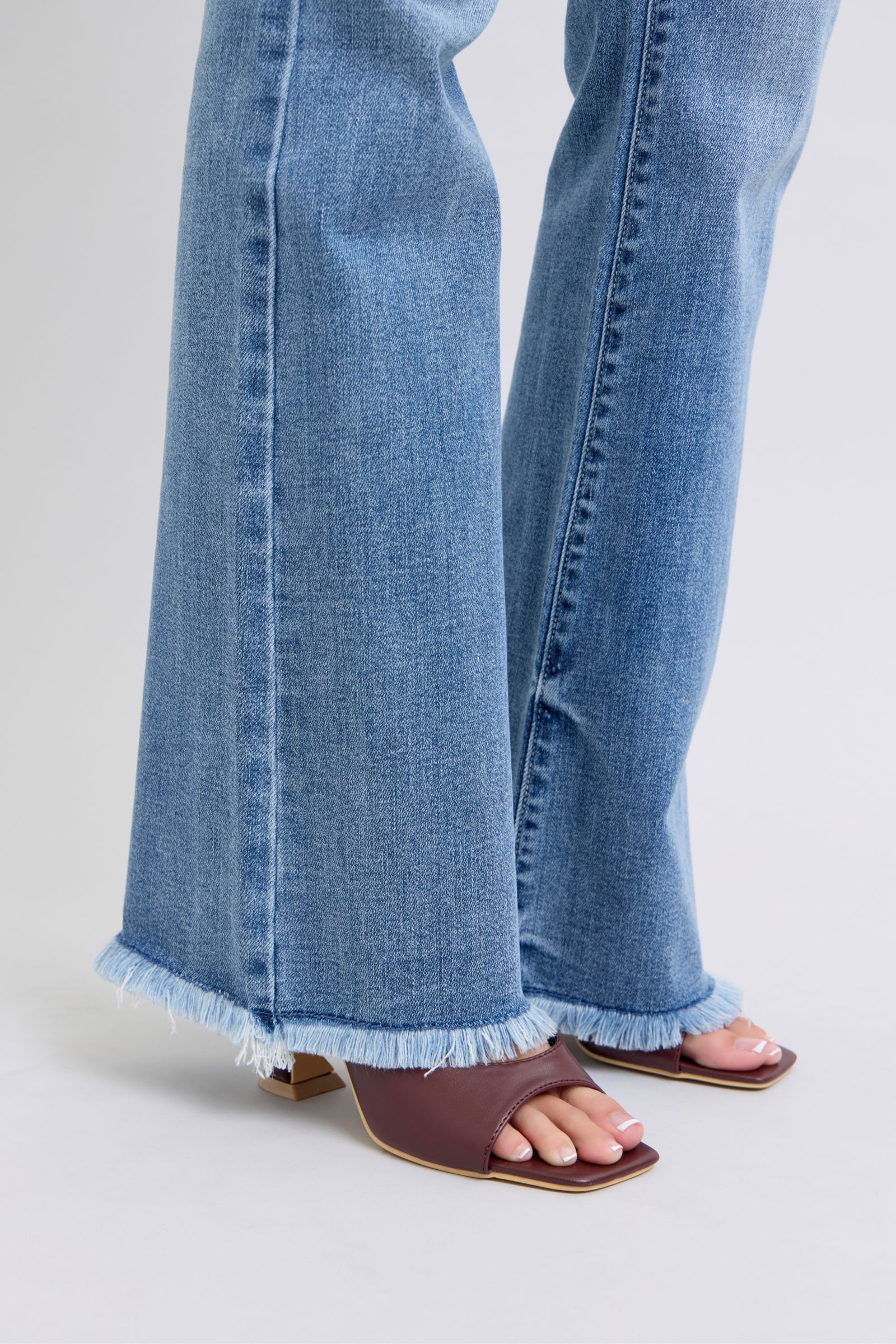 Judy Blue Full Size Raw Hem High Rise Bootcut Jeans - The Ruffled Bull Boutique